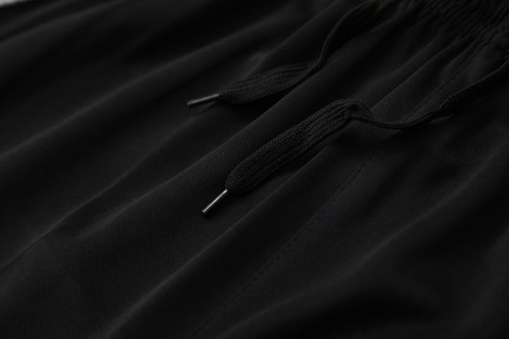 Real Madrid 2025/26 Training Kit - Black/Pink