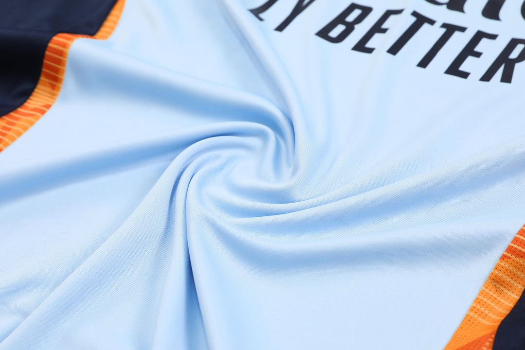 Real Madrid 2024/25 Training Shirt - Light Blue/Orange