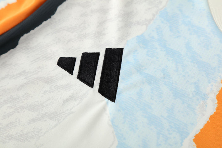Real Madrid 2025/26 Training Shirt - Off-White/Orange